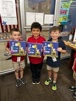 3 boys with library books